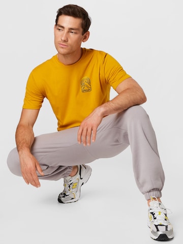 OAKLEY Funkční tričko 'Mountain Sun' – žlutá