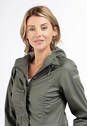 Usha Raincoat in Green