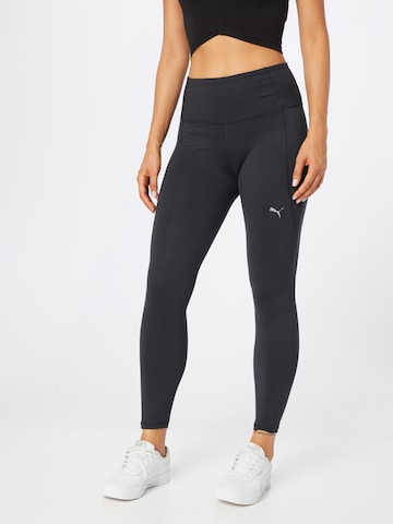 PUMA Skinny Workout Pants in Black: front