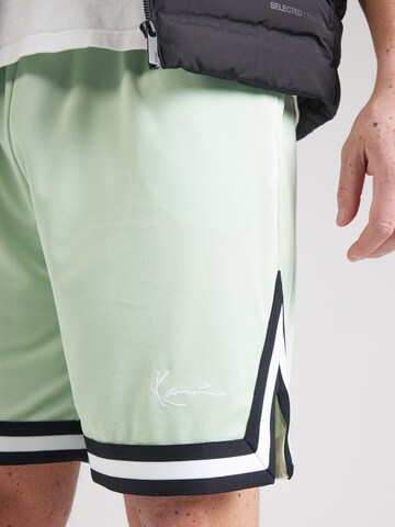 Loosefit Pantalon Karl Kani en vert