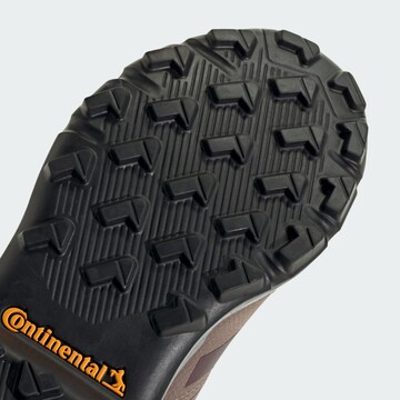 ADIDAS TERREX - Botas em roxo