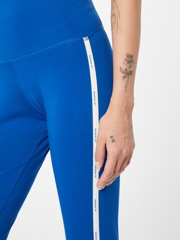Reebok Skinny Sportovní kalhoty – modrá