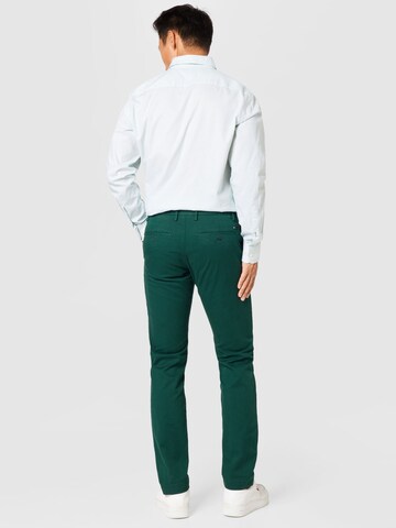 žalia TOMMY HILFIGER Standartinis „Chino“ stiliaus kelnės 'Bleecker'