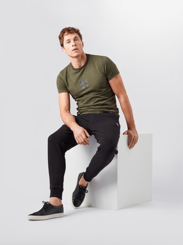 Calvin Klein Jeans Дънки Tapered Leg Панталон в черно