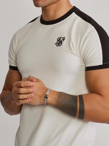 SikSilk - Camiseta 'Stripe Ringer' en beige