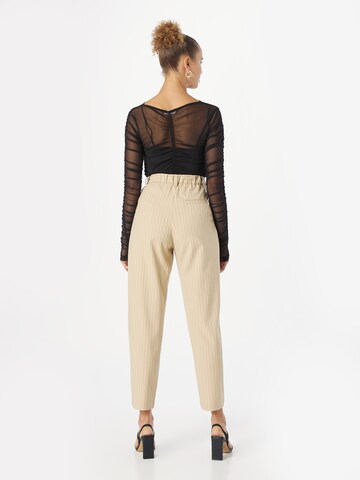 Monki Tapered Veckad byxa i beige