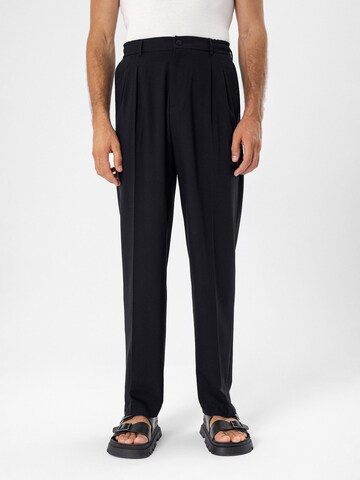 Antioch Loose fit Trousers with creases in Black: front