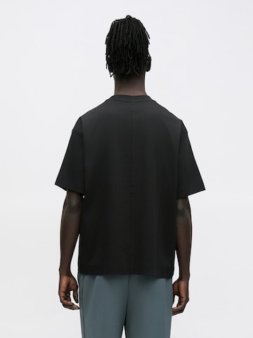 T-Shirt Calvin Klein en noir : derrière