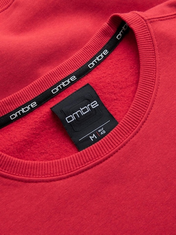 Sweat-shirt Ombre en rouge