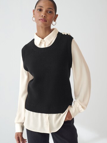 Next Sweater in Black: front