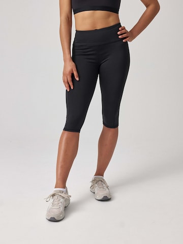 SNOCKS Skinny Sportbroek in Zwart: voorkant