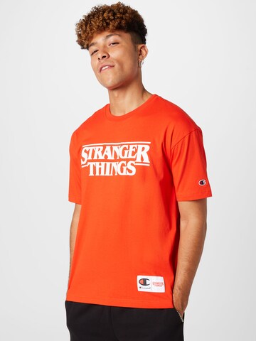 Champion Authentic Athletic Apparel T-Shirt in Orange: predná strana