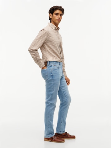 zils TOMMY HILFIGER Piegulošs Džinsi 'Denton'