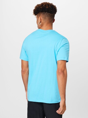 Nike Sportswear T-Shirt 'Swoosh' in Blau