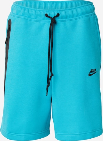 Nike Sportswear - Pantalón 'TCH FLC' en verde: frente