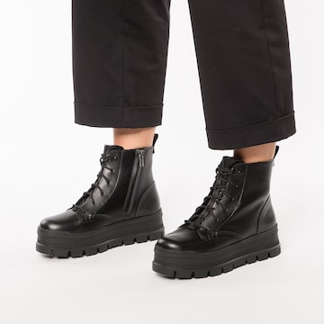 UGG حذاء كاحل برباط 'Sidnee' بلون أسود