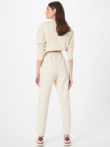 Effilé Pantalon de sport Casall en beige