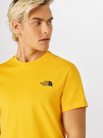 THE NORTH FACE - Ajuste regular Camiseta 'Simple Dome' en amarillo