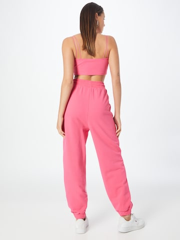 Tapered Pantaloni di Tommy Jeans in rosa