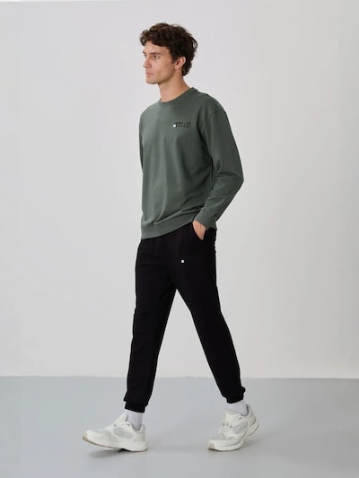 Tommy Life Survêtement en L en vert, Vue avec produit