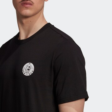 ADIDAS ORIGINALS Tričko 'Disney Graphic' – černá