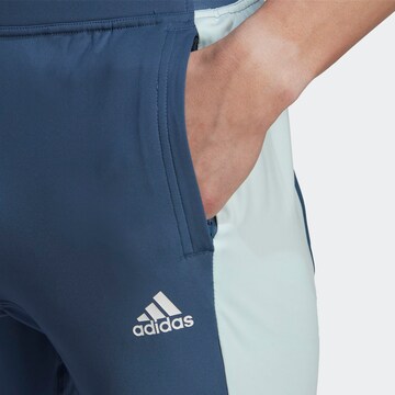 ADIDAS SPORTSWEAR Tapered Παντελόνι φόρμας 'Colourblock' σε μπλε