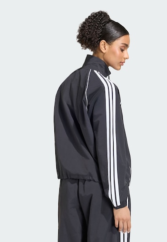 ADIDAS SPORTSWEAR - Casaco de treino 'Iconic' em preto