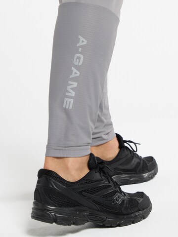 regular Pantaloni sportivi di A-Game in grigio