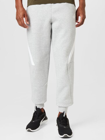 PUMA Tapered Sports trousers 'Esports E7' in Grey: front