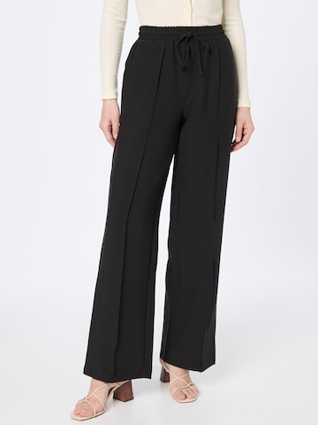 Wide leg Pantaloni con pieghe di Warehouse in nero: frontale