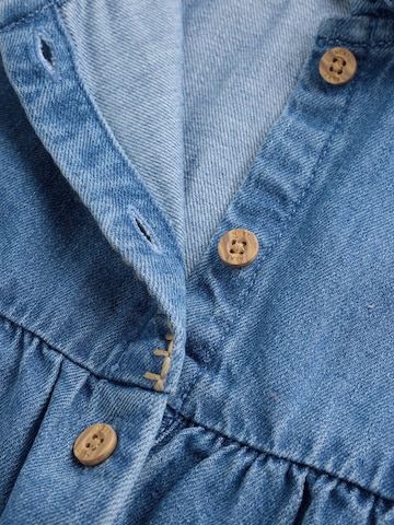 Ensemble Next en bleu