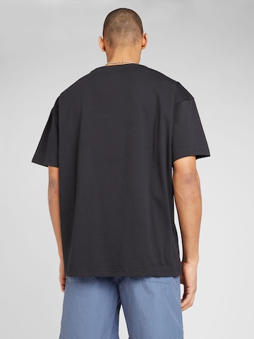 T-Shirt 'STAR CHEV FLOWER' CONVERSE en noir