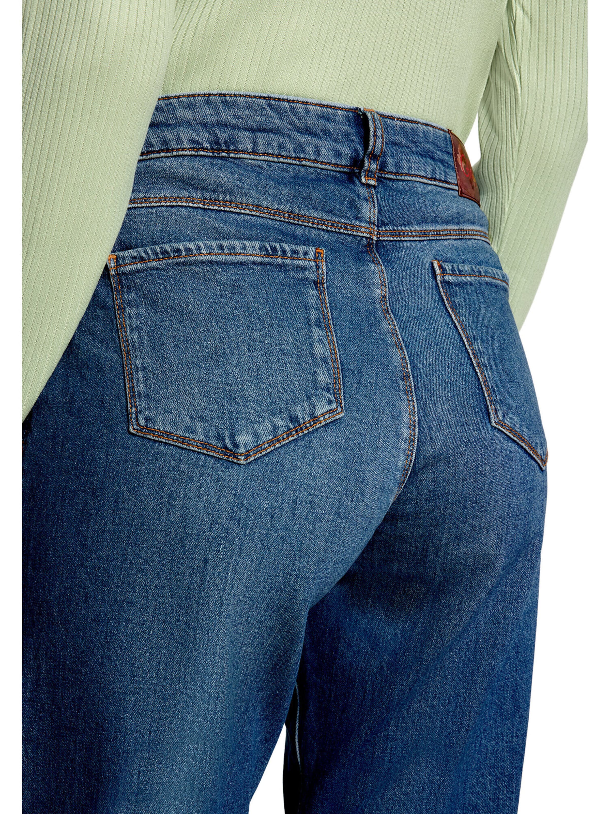Cartoon Flared Jeans in Blau