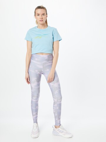 Reebok Skinny Urheiluhousut värissä lila