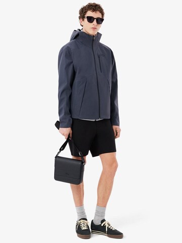 LACOSTE Crossbody bag 'Lacoste Sacoches messenger Chantaco cuir Noir' in Black