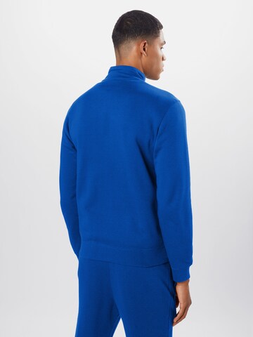 Champion Authentic Athletic Apparel Tracksuit in Blue