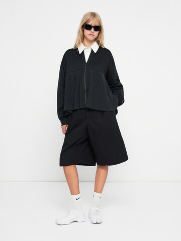 Nike Sportswear Jacke in Schwarz