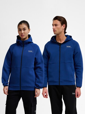 Veste de survêtement 'Tech Fleece' Hummel en bleu : devant