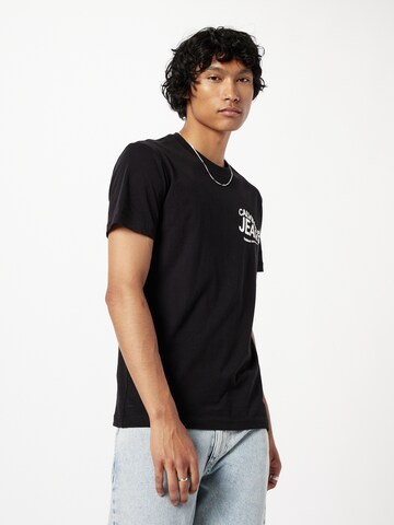 Calvin Klein Jeans T-Shirt 'Future Motion' in Schwarz: predná strana
