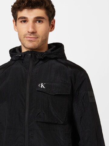 Calvin Klein Jeans Between-Season Jacket in Black