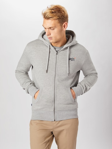 Veste de survêtement Superdry en gris : devant