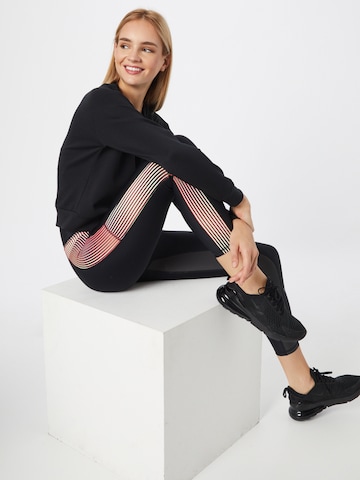 UNDER ARMOUR Skinny Leggings in Schwarz