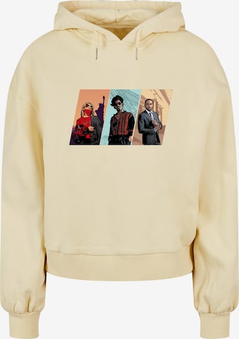 Merchcode Sweatshirt ' Grand Trio' in Geel: voorkant