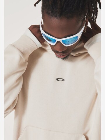 Felpa sportiva 'Metal Rise' di OAKLEY in beige