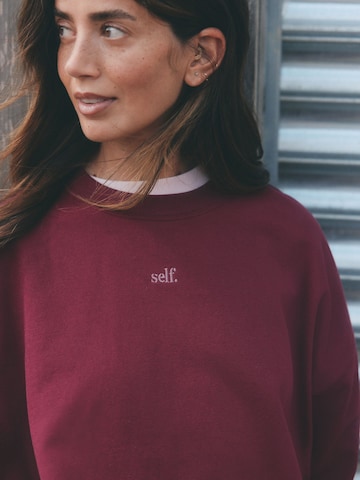 self. Sweatshirt in Red