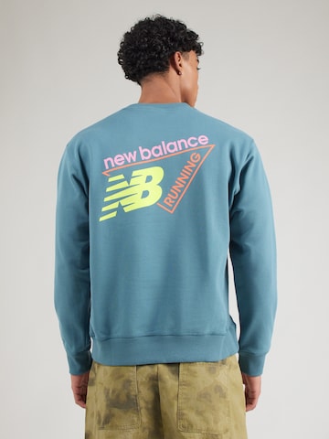 Sweat-shirt new balance en bleu : devant
