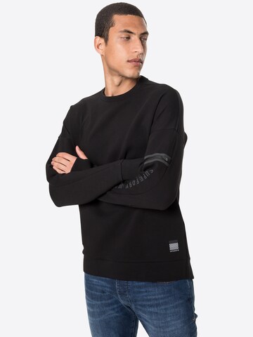 Sweat de sport Superdry en noir : devant