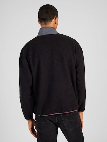 LEVI'S ® Trui 'Polar Fleece Mock Neck Sweatshirt' in Zwart