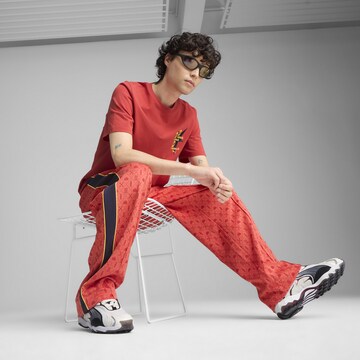 Loosefit Pantalon de sport 'Road To Unity' PUMA en rouge