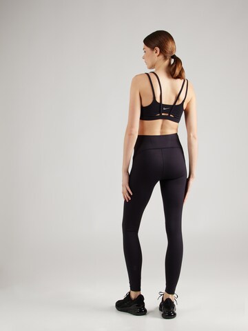 Skinny Pantaloni sportivi 'Movement' di On in nero